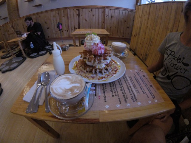 Coffee and waffle stack at Cat N A Cup... super delicious.